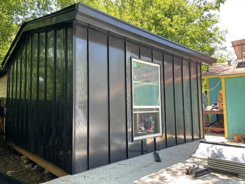 Black standing seam metal wall panels for Roof Inspection in Millbury